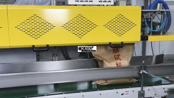 may dong goi va han mieng tui lien tuc tu dong danh cho bao bi phuc hop giay-nhua loai tai trong lon (20-50kg) fbc-2 hinh 1